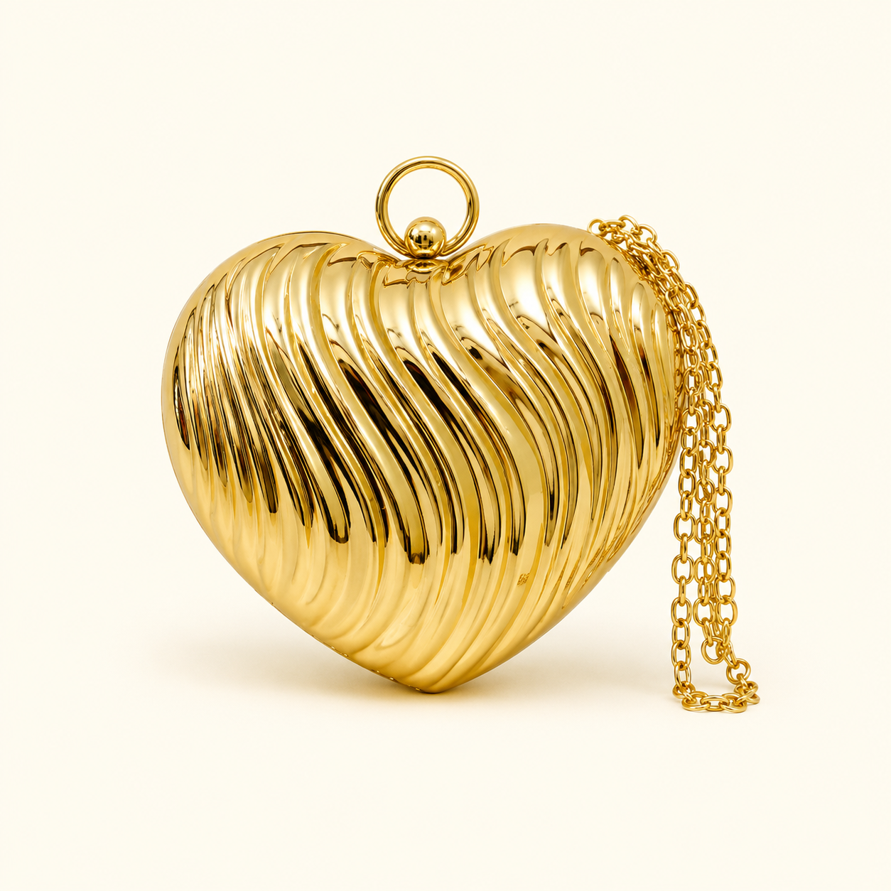 Heart shape metal clutch premium quality 💯 golden colour